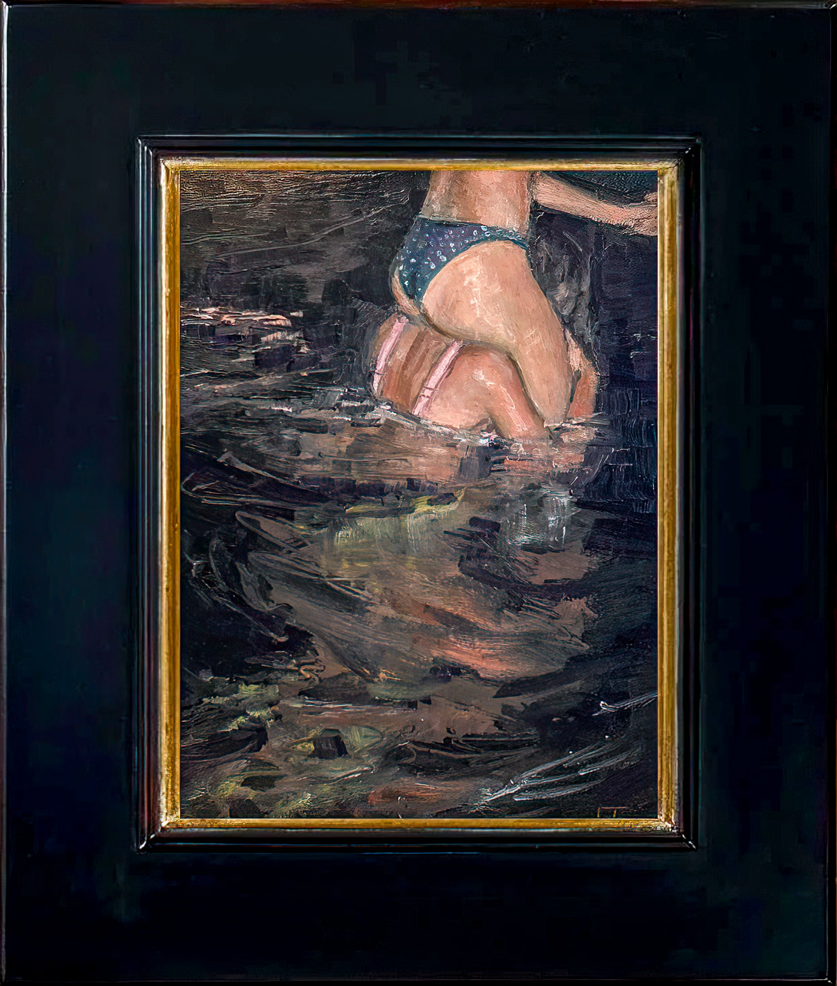 This image shows the black wooden frame with a inner gold border in which the painting ships.