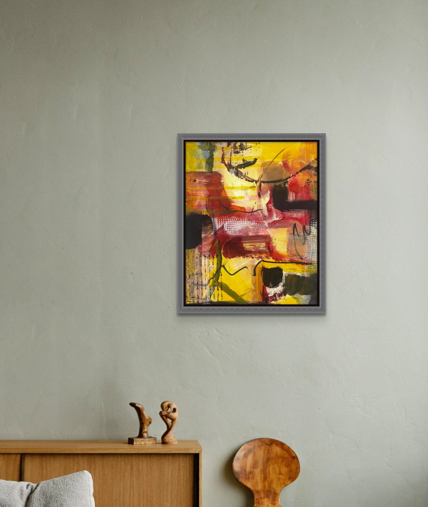 bstract painting featuring colors of a sunrise in various shapes. Yellows, reds, oranges and greens; artist Bob Hogue; 8"Wx10"H; shown in situ