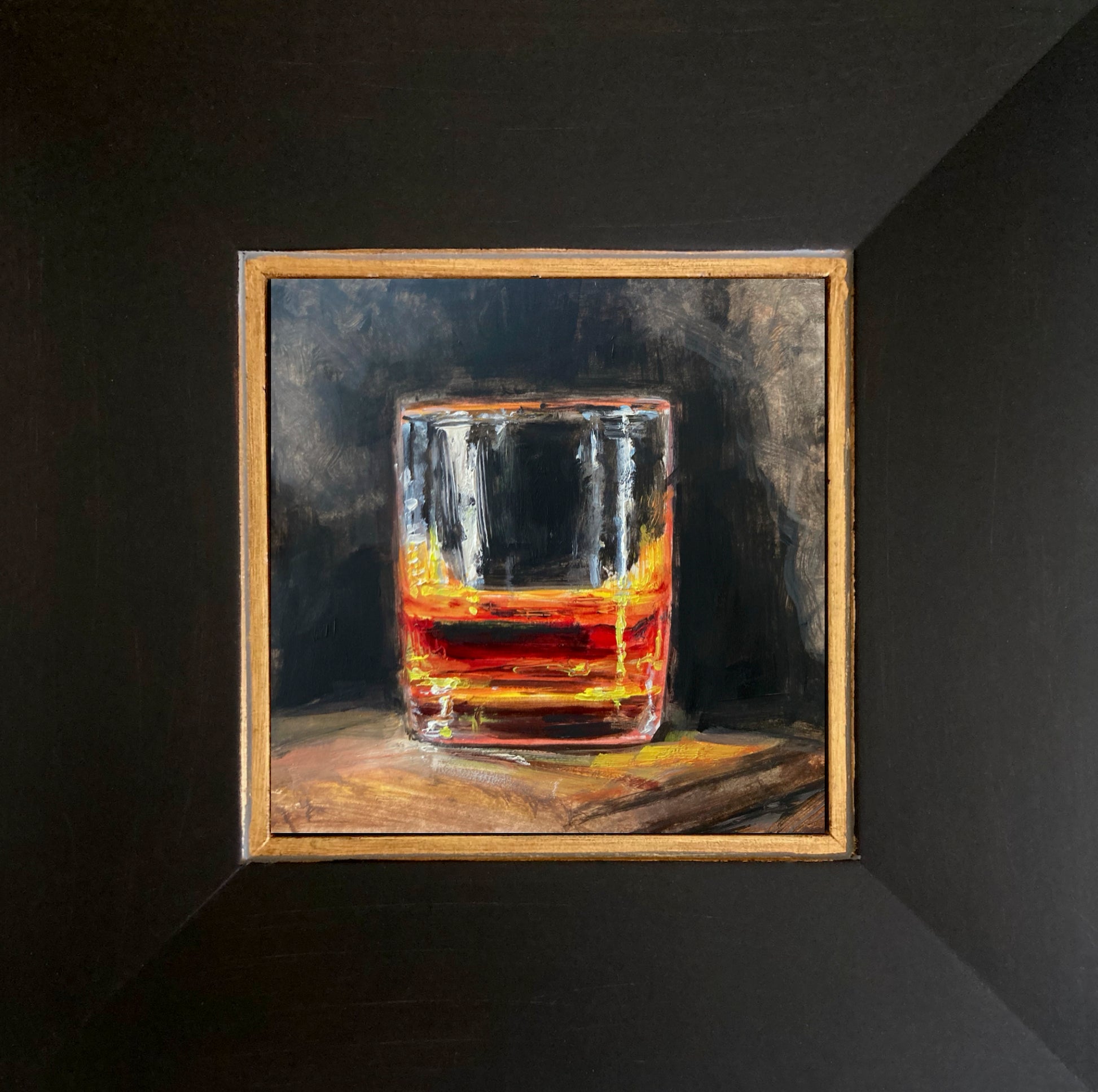 Oil painting of cocktail glass and drink by E. E. Jacks - dark background. Dark wood frame with gold trim  