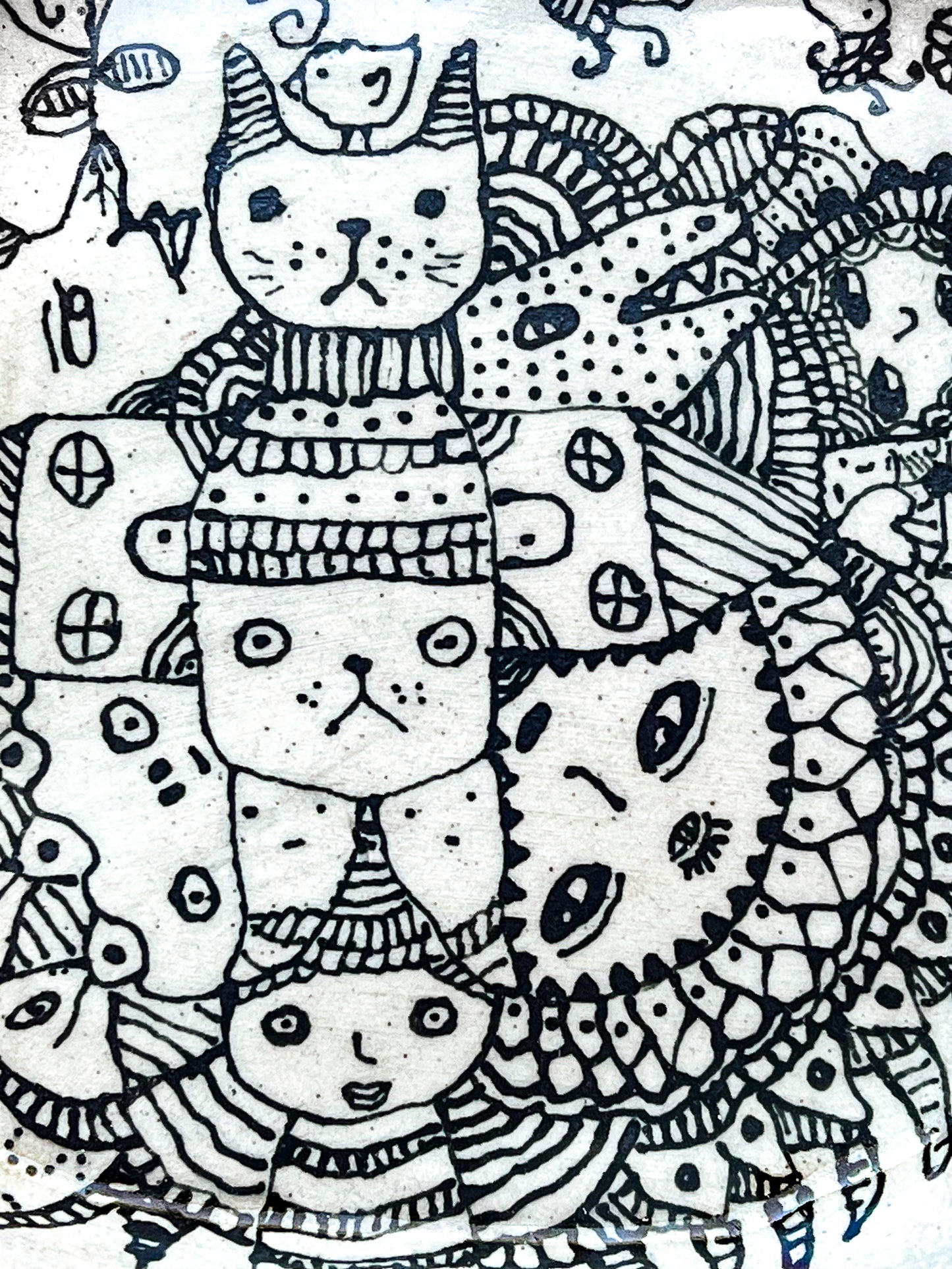 Black and white illustrations art of cats wearing hats with intricate patterns. This is a zoomed in image to show the detail.