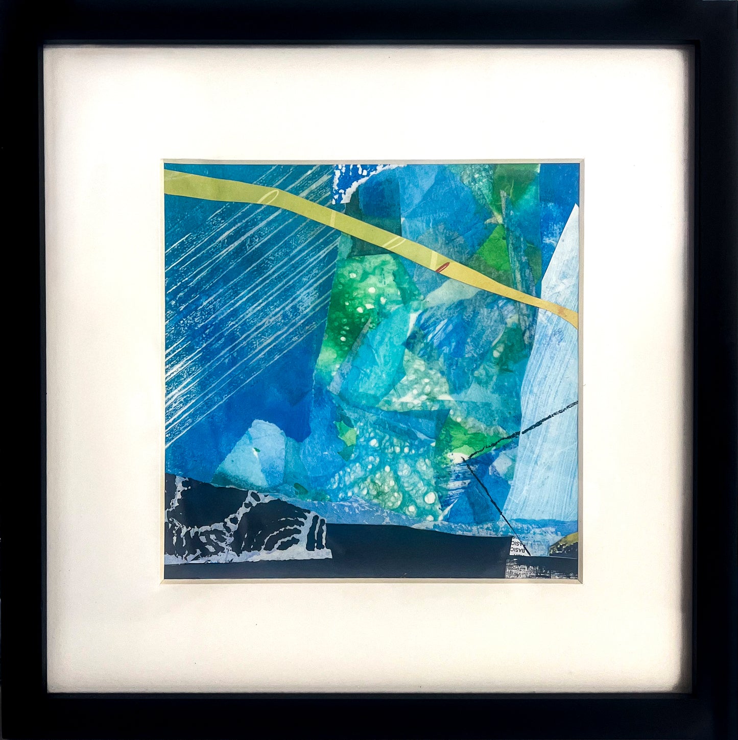 Framed 8"x8" abstract artwork with blue, green, and yellow colors; white mat, 1" black frame; artist Bob Hogue