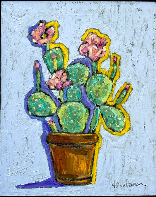 A pot full of a prickly pear cactus is the subject of this painting. The pot is small and brown with highlights. There are three full blooms and a number of buds on the cactus. The background is light blue.