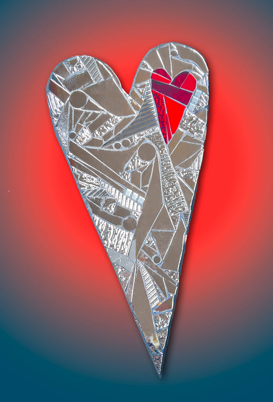Heart-shaped mirrored-glass mosaic with small red mirror heart inset on a wood backing; 9