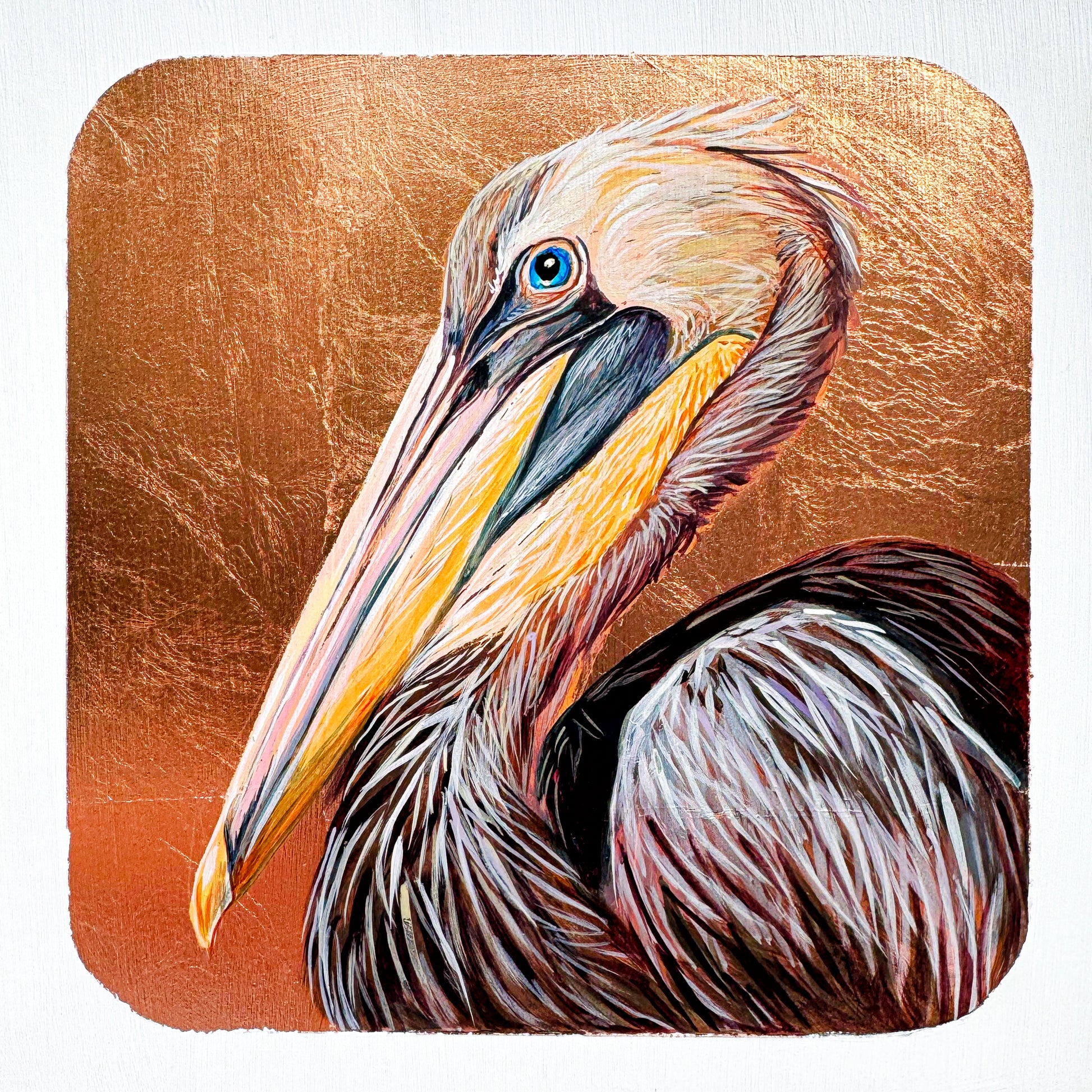 A copper leaf background works perfectly with the hues of the feathering on this image of a pelican's face and beak. The layers of color which form the head and the striking blue eye makes for a stunning piece.