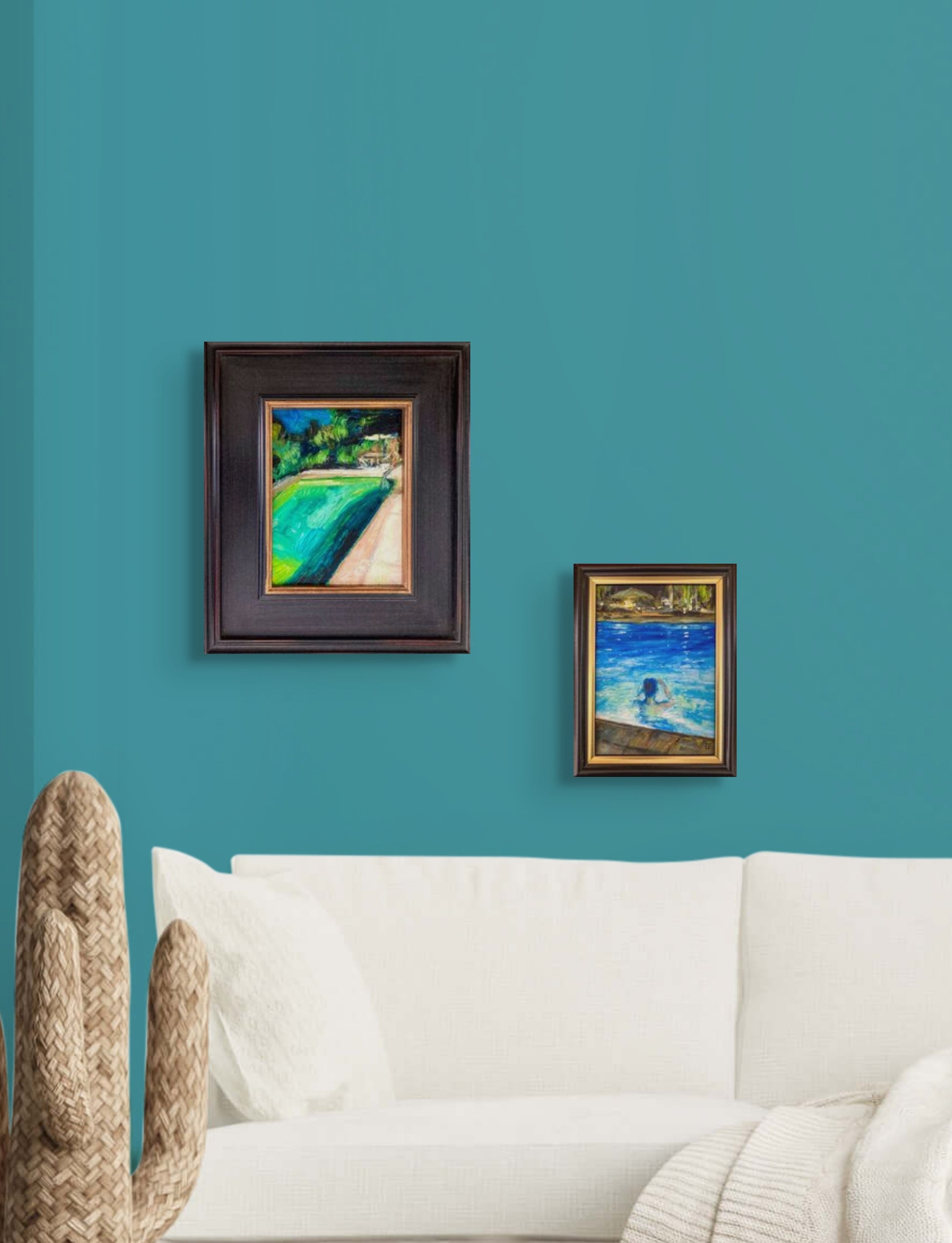 Colorful oil painting on paper; back view of person in pool at night; vibrant blues and impression of lights and umbrella in background; 5"x7" image with dark wood frame with gold gild inlay; title - In It; artist E.E. Jacks; shown on wall in situ paired with another painting by same artist of swimming pool;
