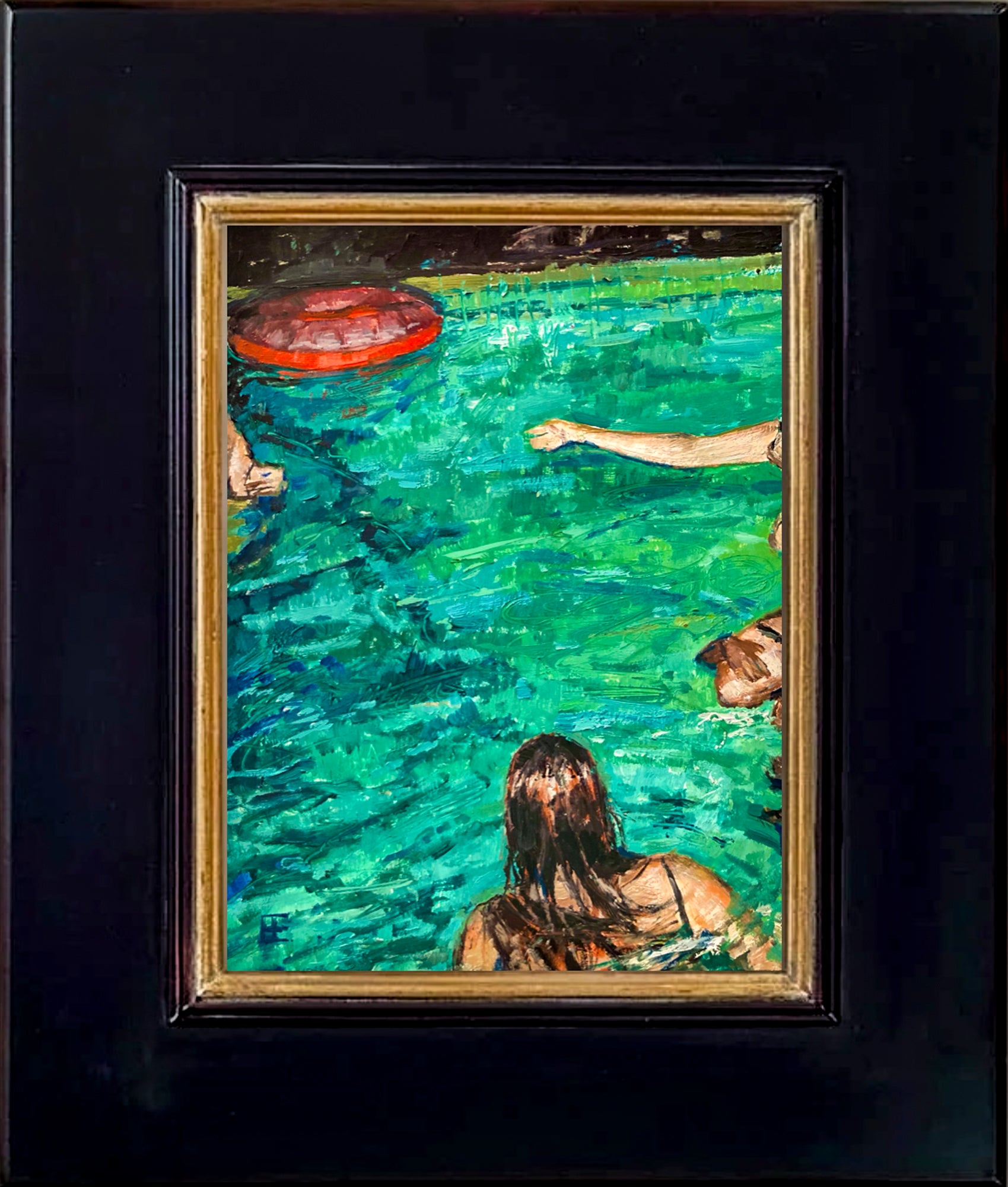 Shimmering light reflections off the top of the water of a pool where people relax and enjoy. A red inner tube is seen floating on the edge. An arm, a shoulder and the back of one swimmer are also in the frame.