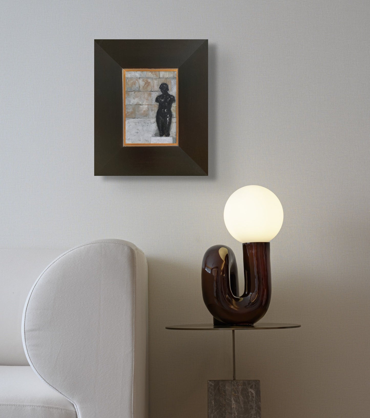 Oil painting of black statue figure against beige block wall titled 'The Axis' by E. E. Jacks