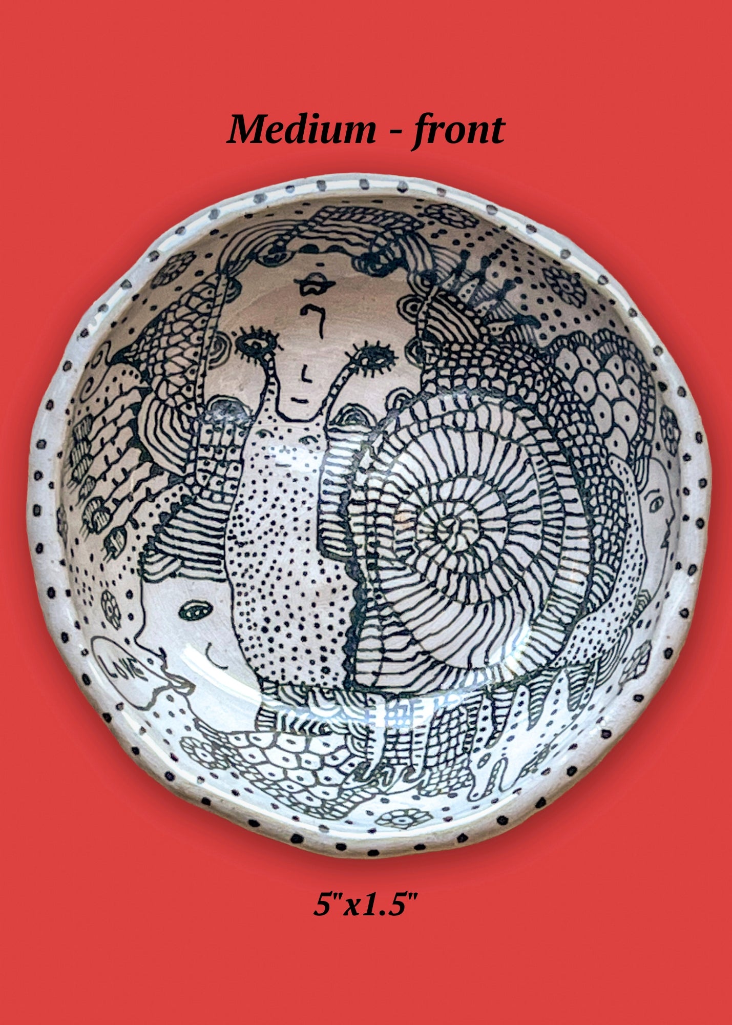 Ceramic bowl with black and white design on a red background. The central figure in this design is a snail that is surrounded by faces - one which says the word "love".