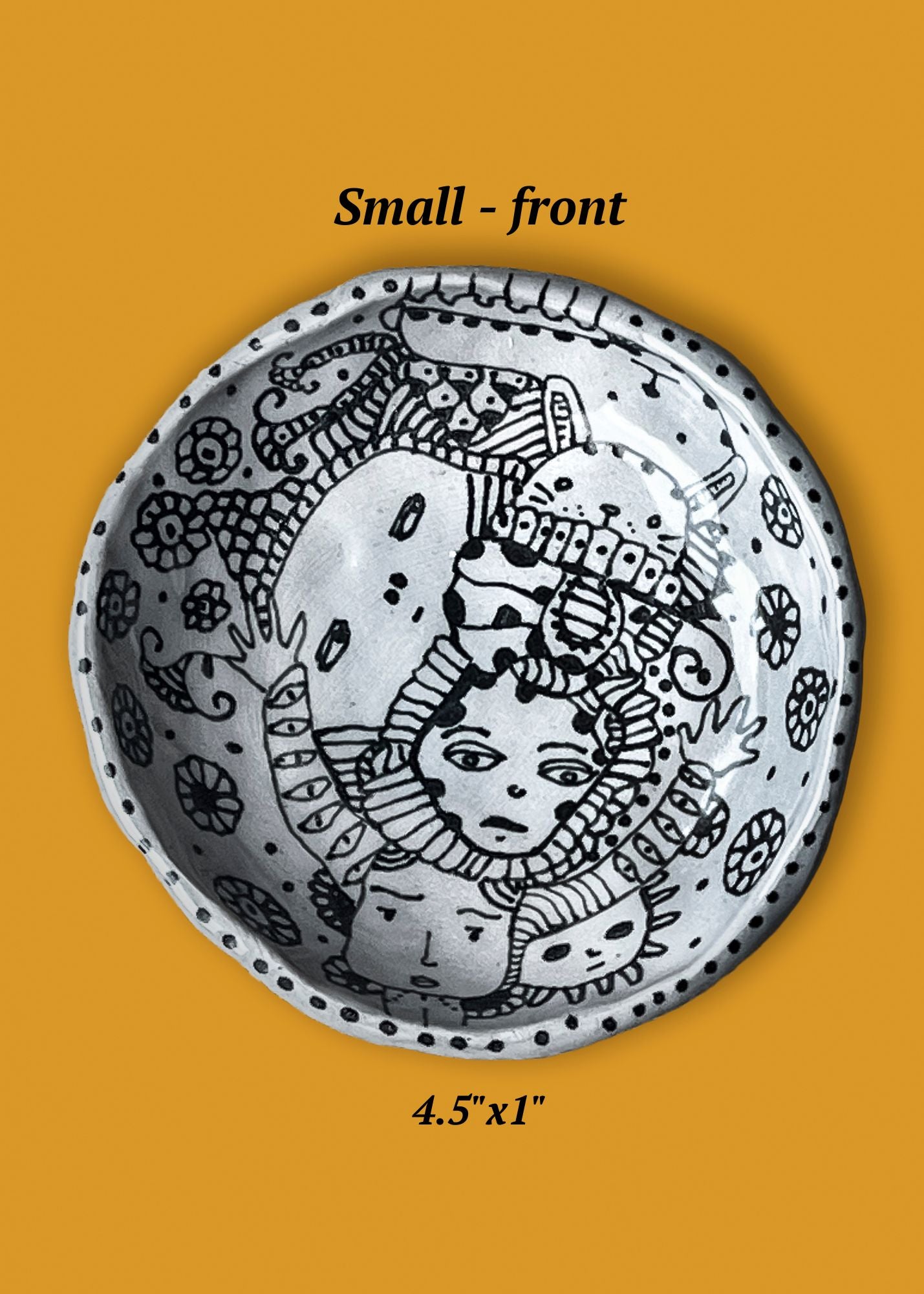 Front version of ceramic bowl with eclectic ink-drawn designs of animals, flowers, geometrics; artist Deb Blanco; 4.5" x 1"