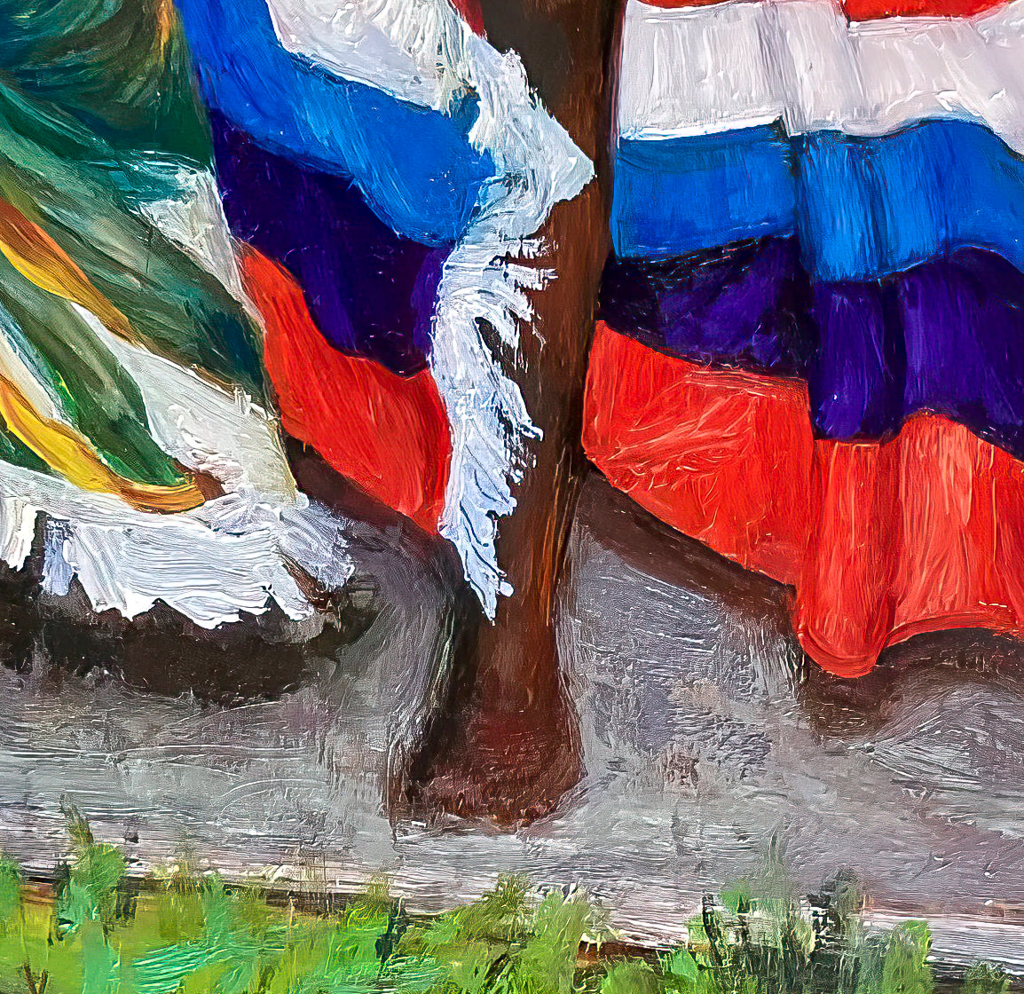 Close up of lower section of subjects legs with the red, white, blue and purple shawl.