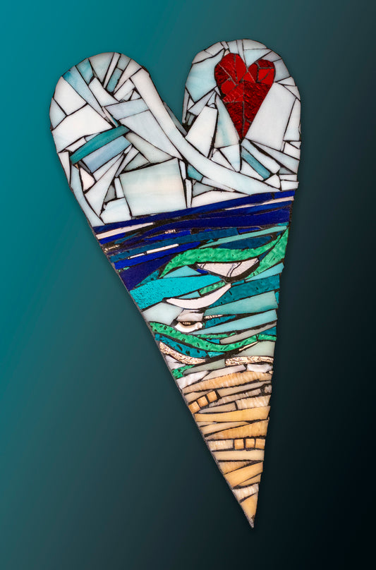 Multi-colored glass mosaic heart; white upper with red glass heart; blues and greens in lower portion with small glass arm depicted swimmer in lower portion; artist Denise Marshall