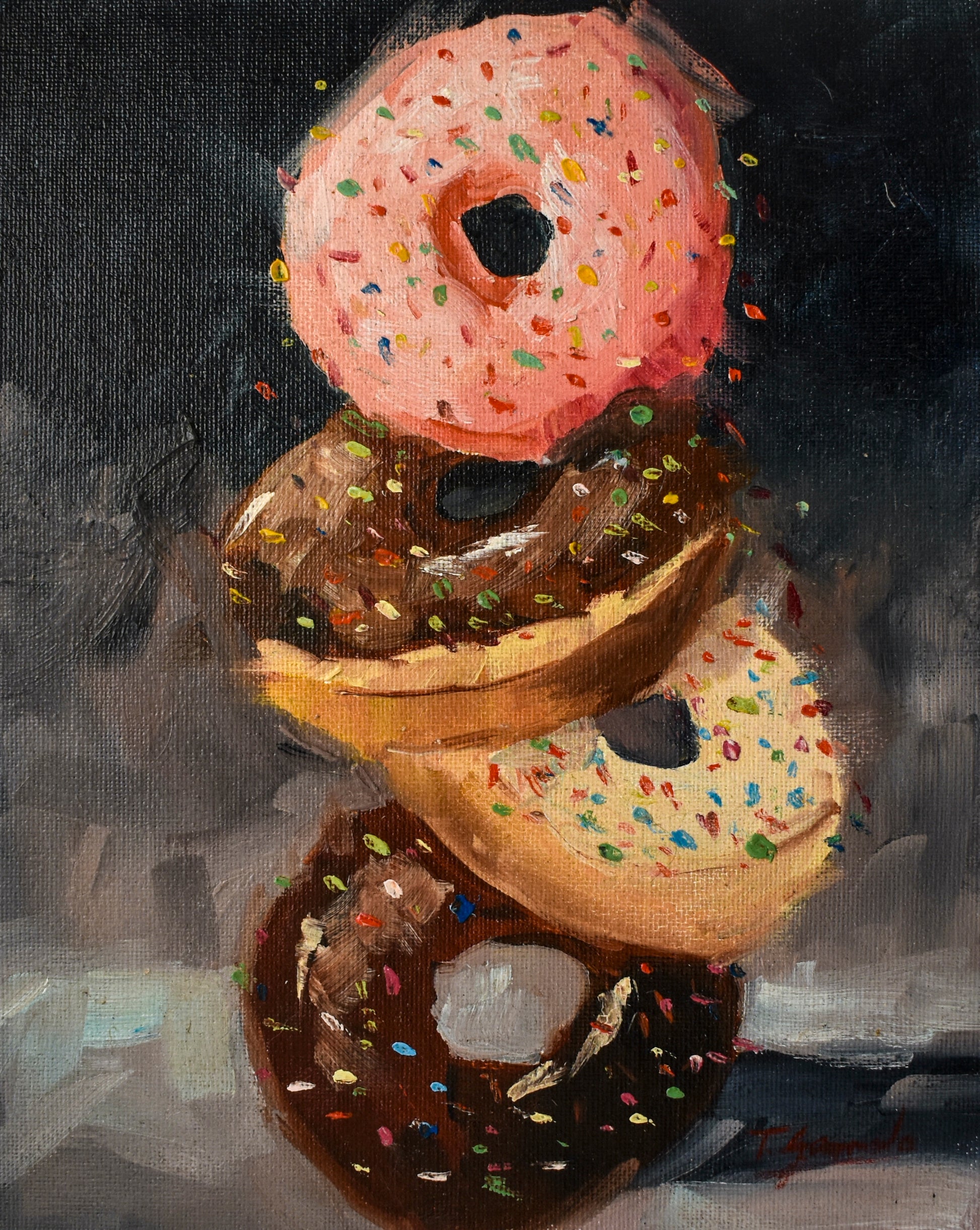 Four iced donuts balancing on one another. Donuts are strawberry, vanilla and chocolate sprinkles; artist Teri Gammalo; 8"Wx10"H