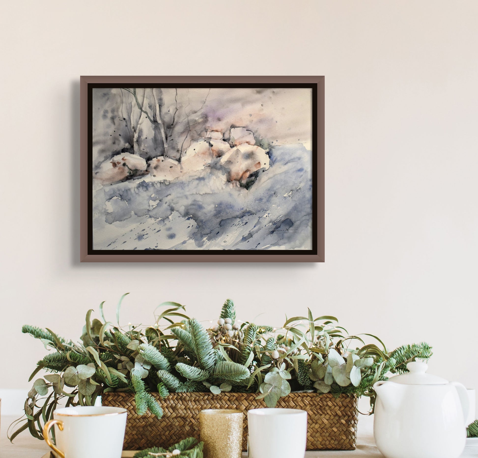 Original watercolor depicting a snow scene in nature with boulders and barren trees. Hues of grey, white and tans, shown in situ; artist Teri Gammalo; 15"Wx11"H