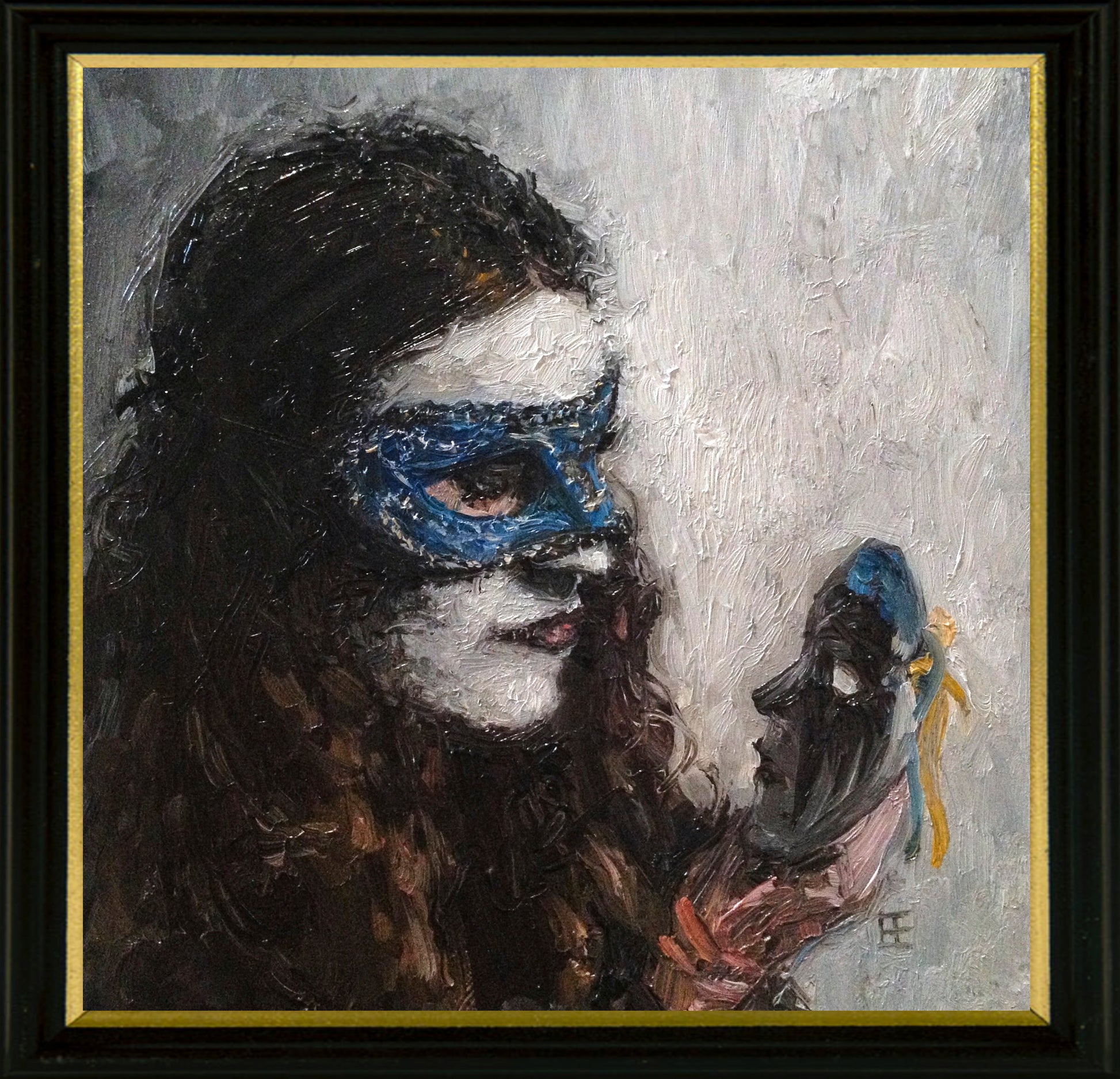 Masked woman with white make up wearing blue mask holds up a new black mask to consider; artist E. E. Jacks; 8"Wx8"H framed