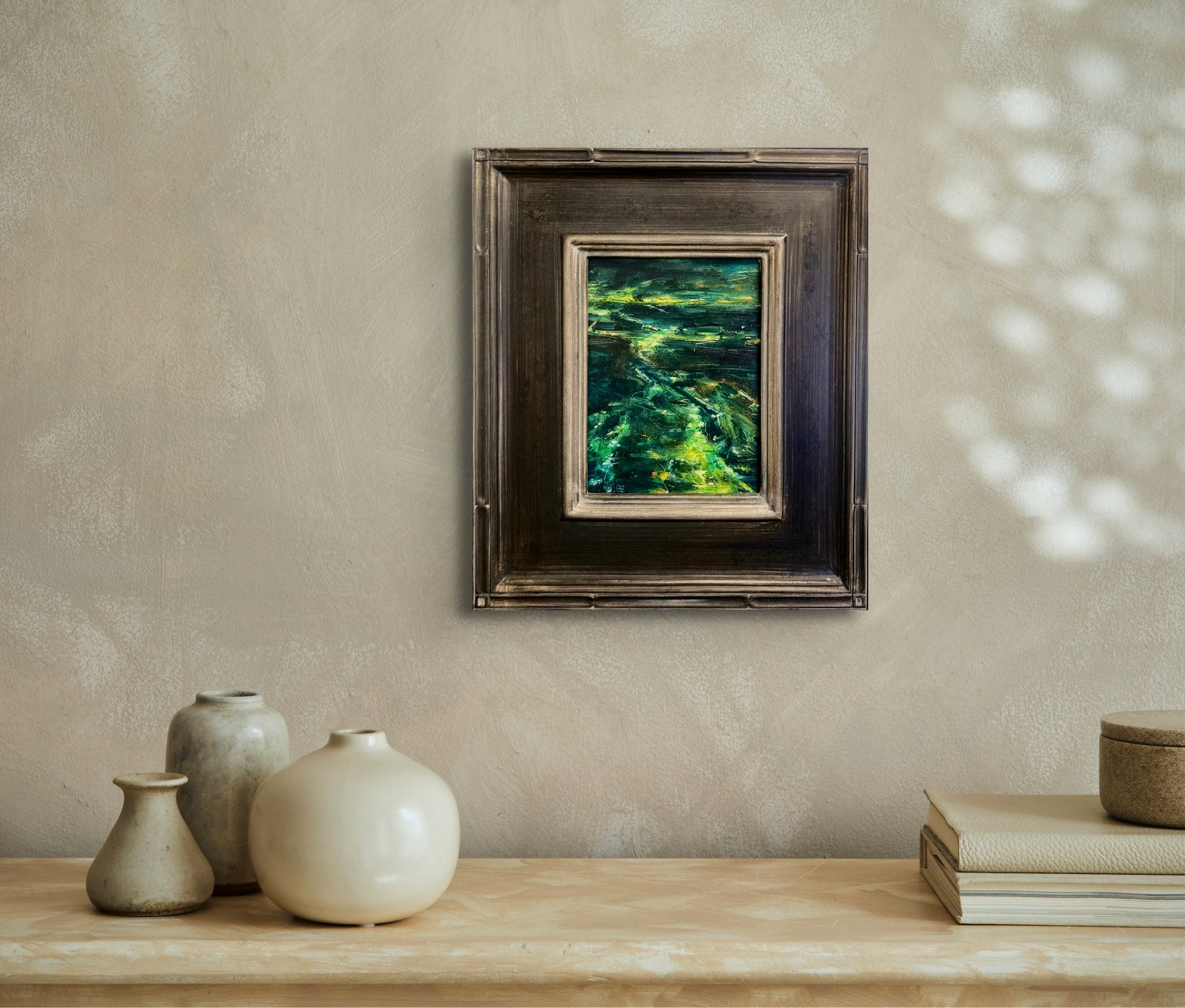 Abstract oil painting in green shades titled 'East End' by E. E. Jacks in situ