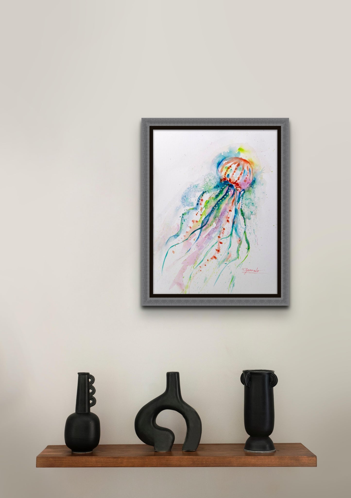 Colorful watercolor drawing of a jellyfish titled 'Going with the Flow' by artist Teri Gammalo, floated against a black background and in a grey wood frame.