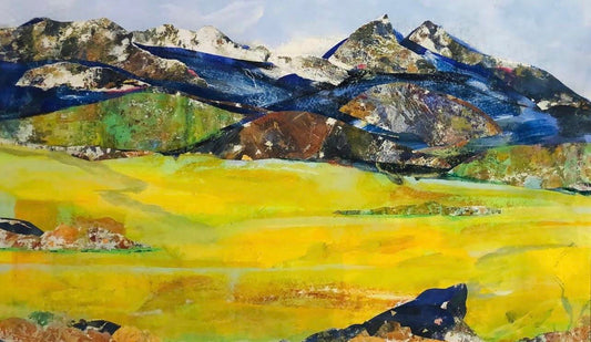 Mixed media image showing a golden valley in front of a mountain range featuring blues, browns, blacks and greens. The image is representational with ragged edges and abstract images; artist Bob Hogue; 23"x14" unframed