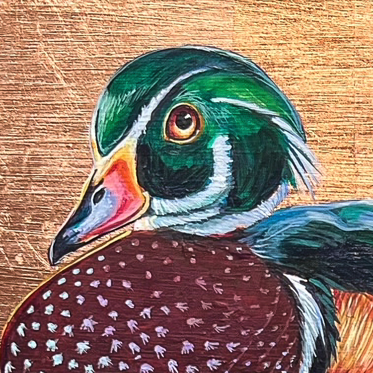 Colorful mallard duck with copper leaf background and underwater view of his dangling feet and two small fish; closeup of head detail; artist Marie Lavallee; 12"x12"