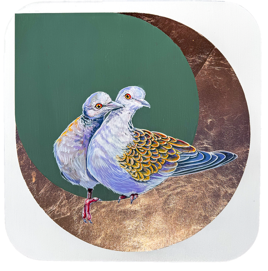 These two rock pigeons are cuddling up against a background of teal and copper leaf. 