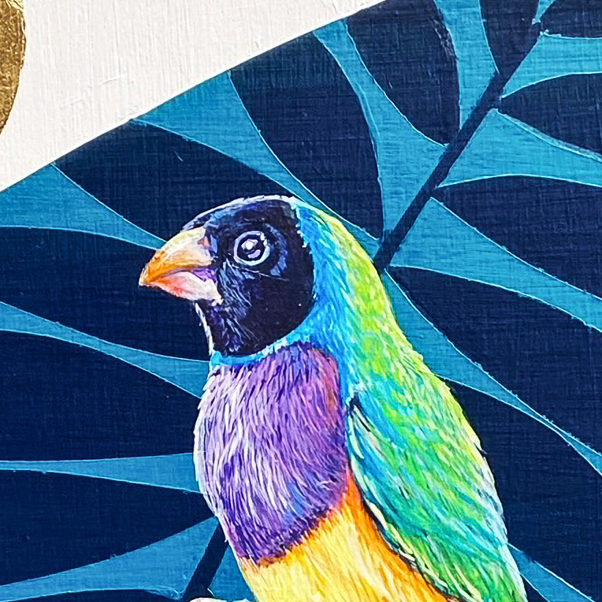 Acrylic painting of two blue, green and yellow finches are shown with a blue leaf background with black and gold leaf accents; closeup of bird detail; artist Marie Lavallee; 12"Wx16"H