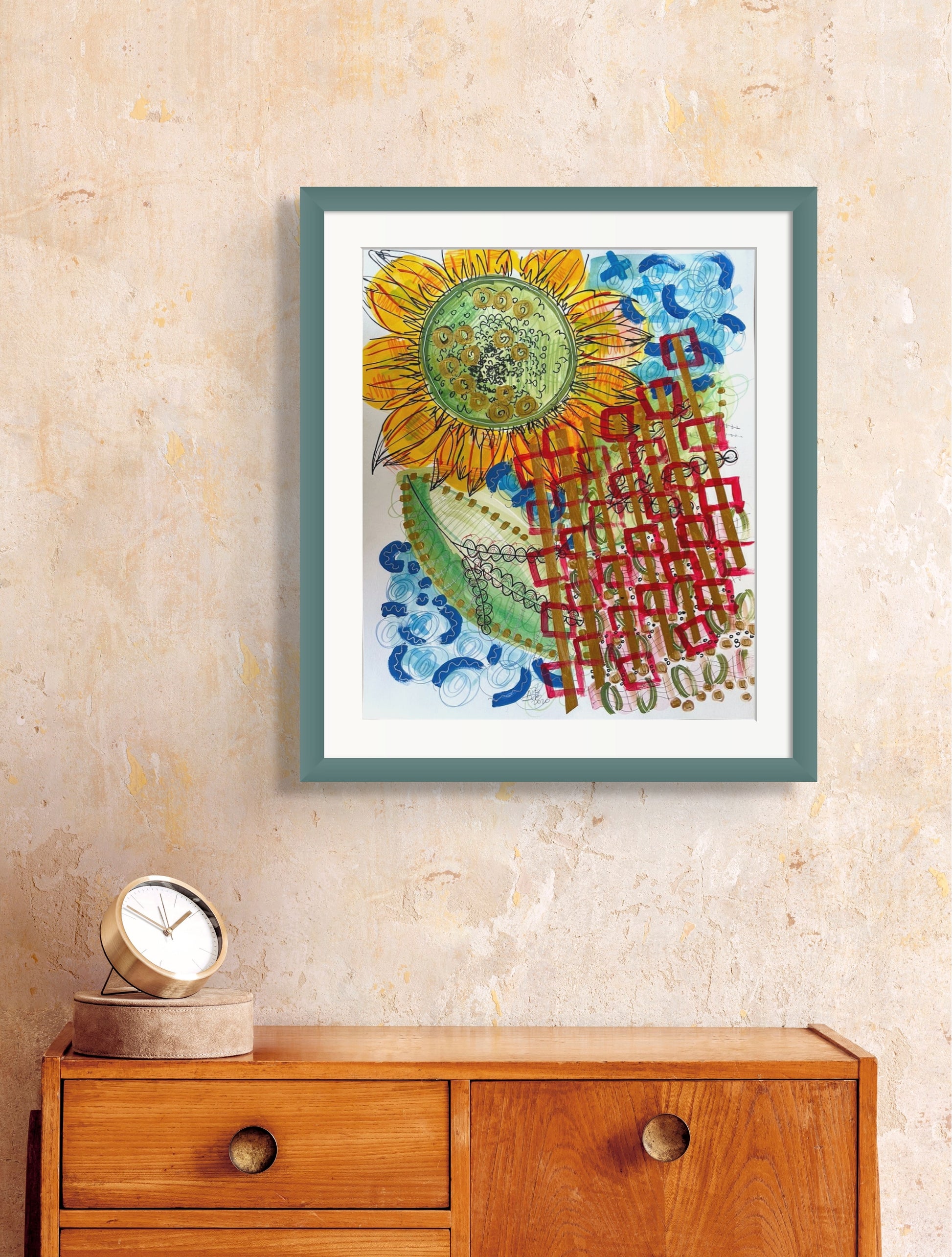 Colorful mixed media abstract and graphic design titled Sunflower at Sea by artist Jenifer Hernandez., framed for display only in blue painted wood and white mat.