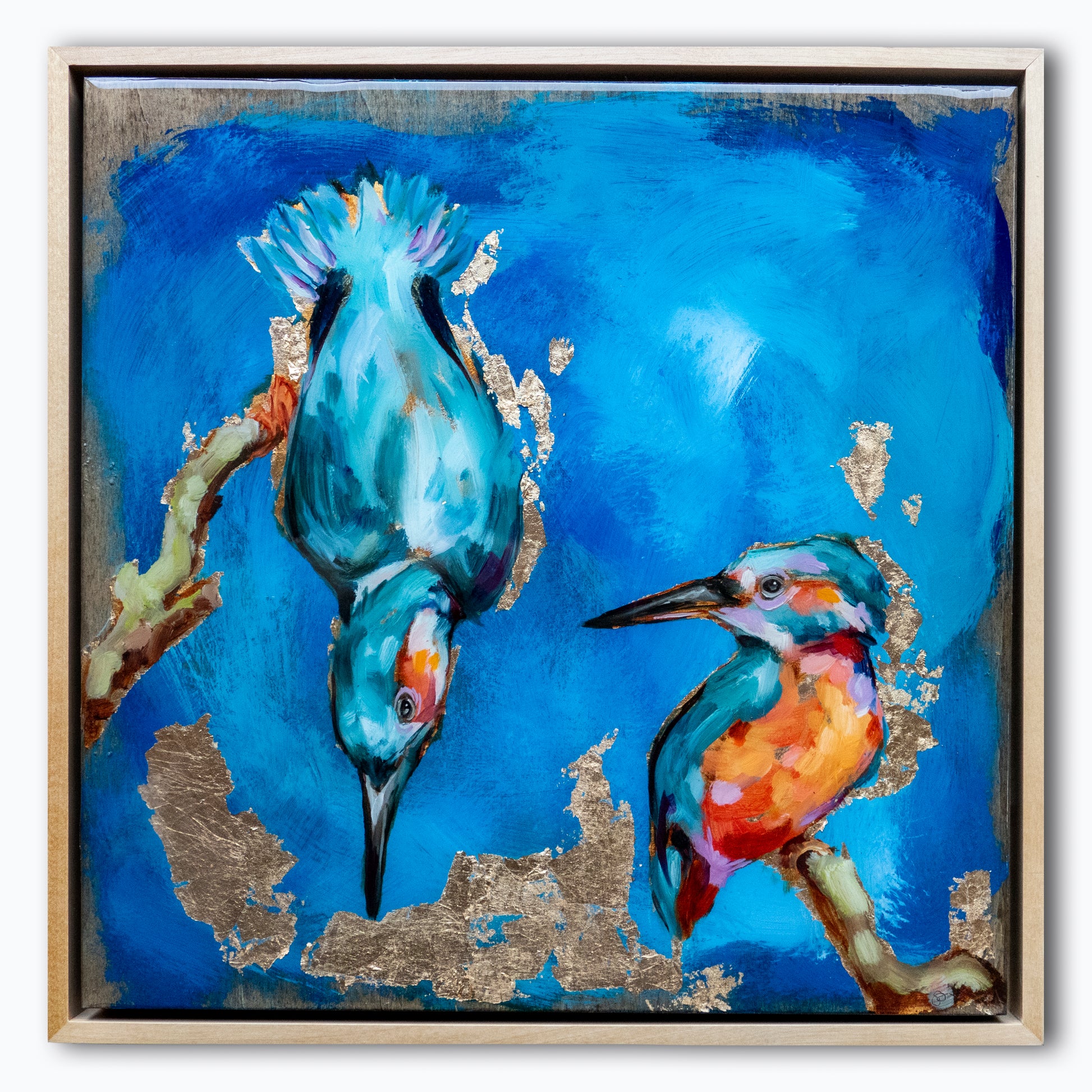 12.5"x12.5" painting of two Kingfishers is mixed media; using acrylic and oil, pencil, and gold leaf with glossy resin finish on surface; colorful with mostly blues and golds; artist Shaney Watters; incl raw maple float frame