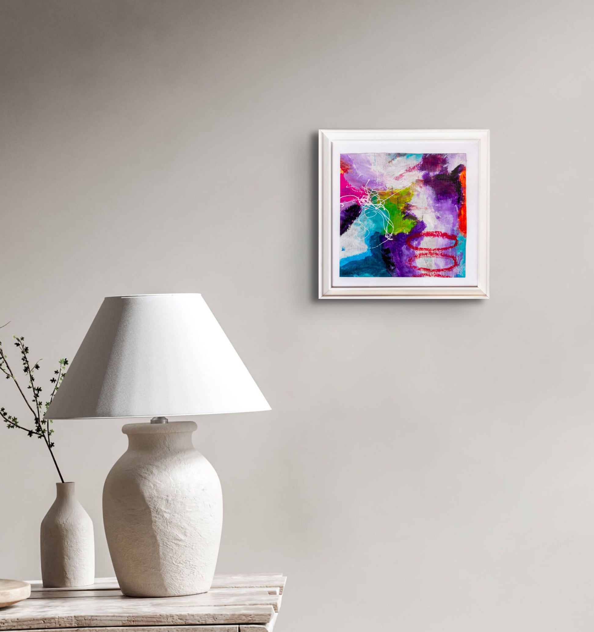 Colorful acrylic abstract painting on paper titled 'Part of the Whole #11' by artist Steffi Möllers; measures app 7.5"x7.5"; w/frame measures app 10"x10"; image shown in situ hanging on wall.