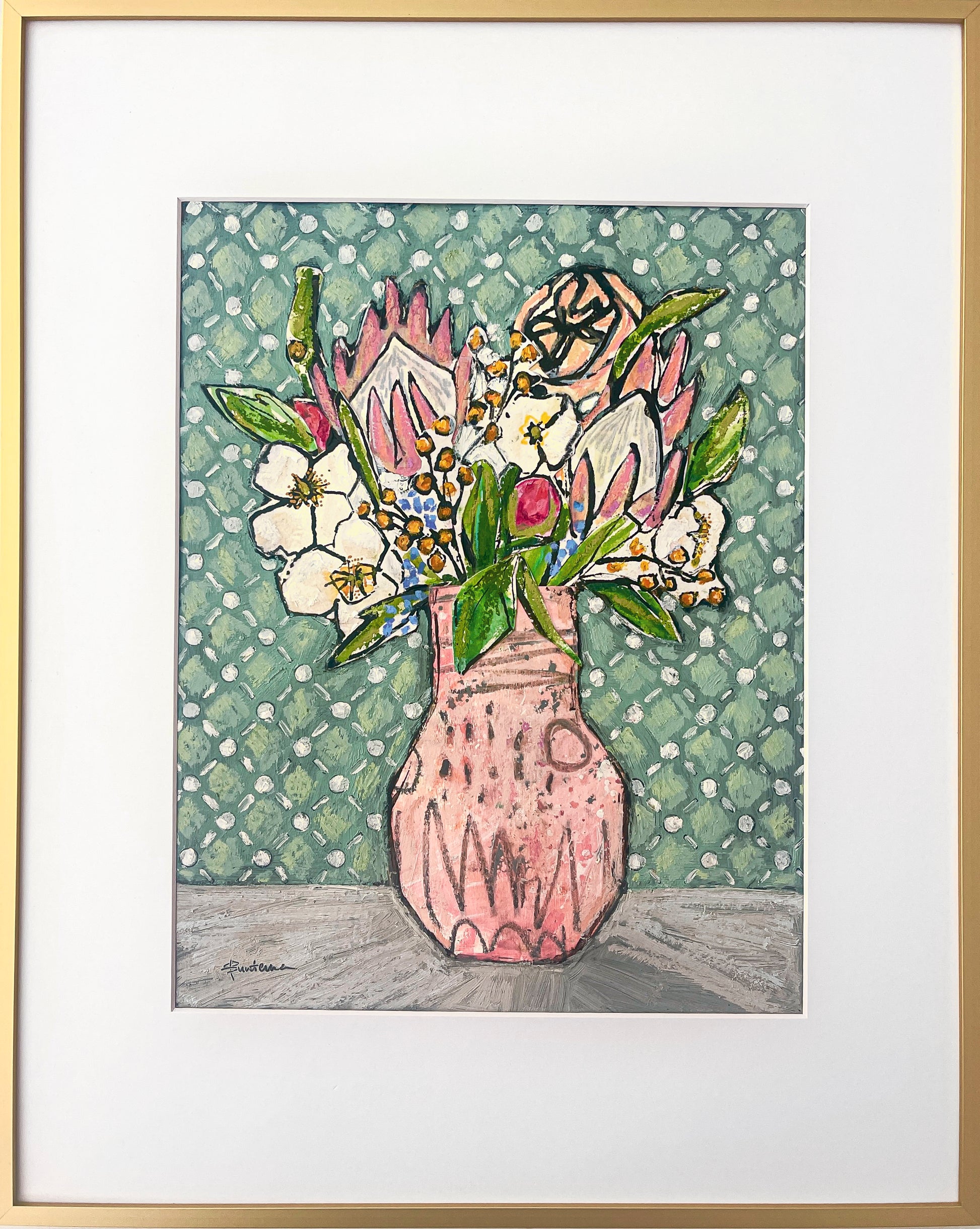 Painted collage of flowers, including protea blooms, in abstract pink vase against a blue/green checked background; shown w/white mat and thin gold metal frame; artist Rachel Bunteman