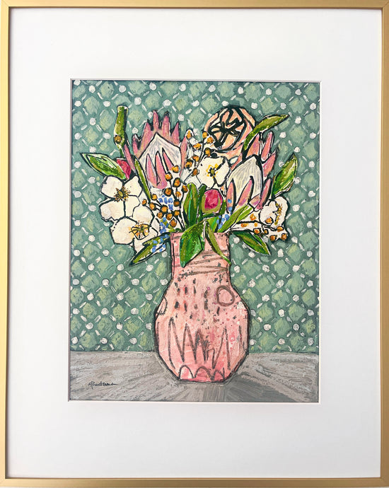 Painted collage of flowers, including protea blooms, in abstract pink vase against a blue/green checked background; shown w/white mat and thin gold metal frame; artist Rachel Bunteman