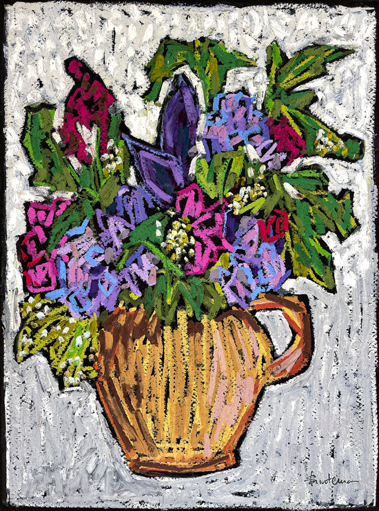 Colorful bouquet of flowers in a brown vase with a handle.  The flowers are shown against a textured white background