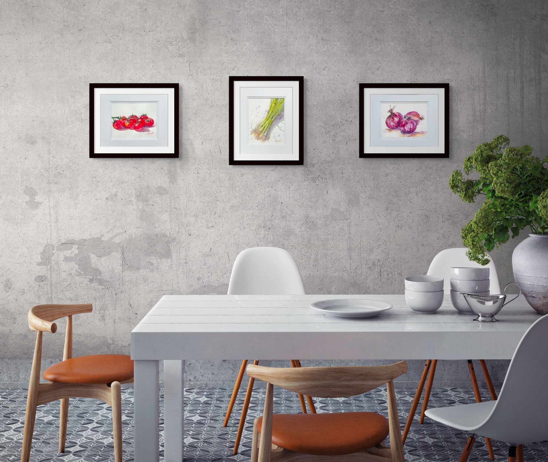 Teri Gammalo's kitchen set are shown here hung on a gray wall above a dining room table. Pieces include "Straight from the Garden", "Tomatoes on the Vine" and "Ready to Slice"