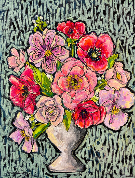 This view shows the subject of a beautiful vase of flowers in the shades of red and pink. The vase is small and white. The background, is a series of varied lines, curved and straight over a black background.