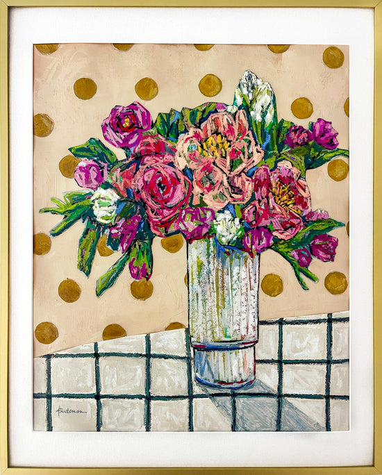 Painting and collage of mixed bouquet of flowers in a clear vase, sitting on a white/black checked tablecloth and against a beige background decorated with dark yellow circles; shown w/white mat and thin gold metallic frame; artist Rachel Bunteman