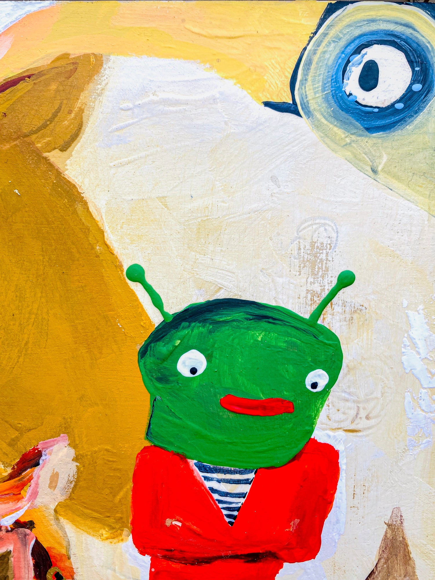 This images shows a closeup of the alien maks and the blue eye or blue eyed creature in the corner of the painting. It is abstract