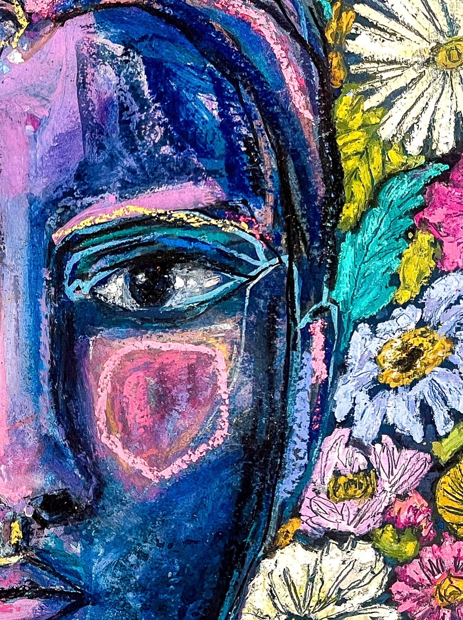 The right side of the abstract face is darker blue with a geometric shape on the cheek in pink. The eyes are outlined in teal and pinks from the other side of the face are evident. The image also includes a portion of the floral background.