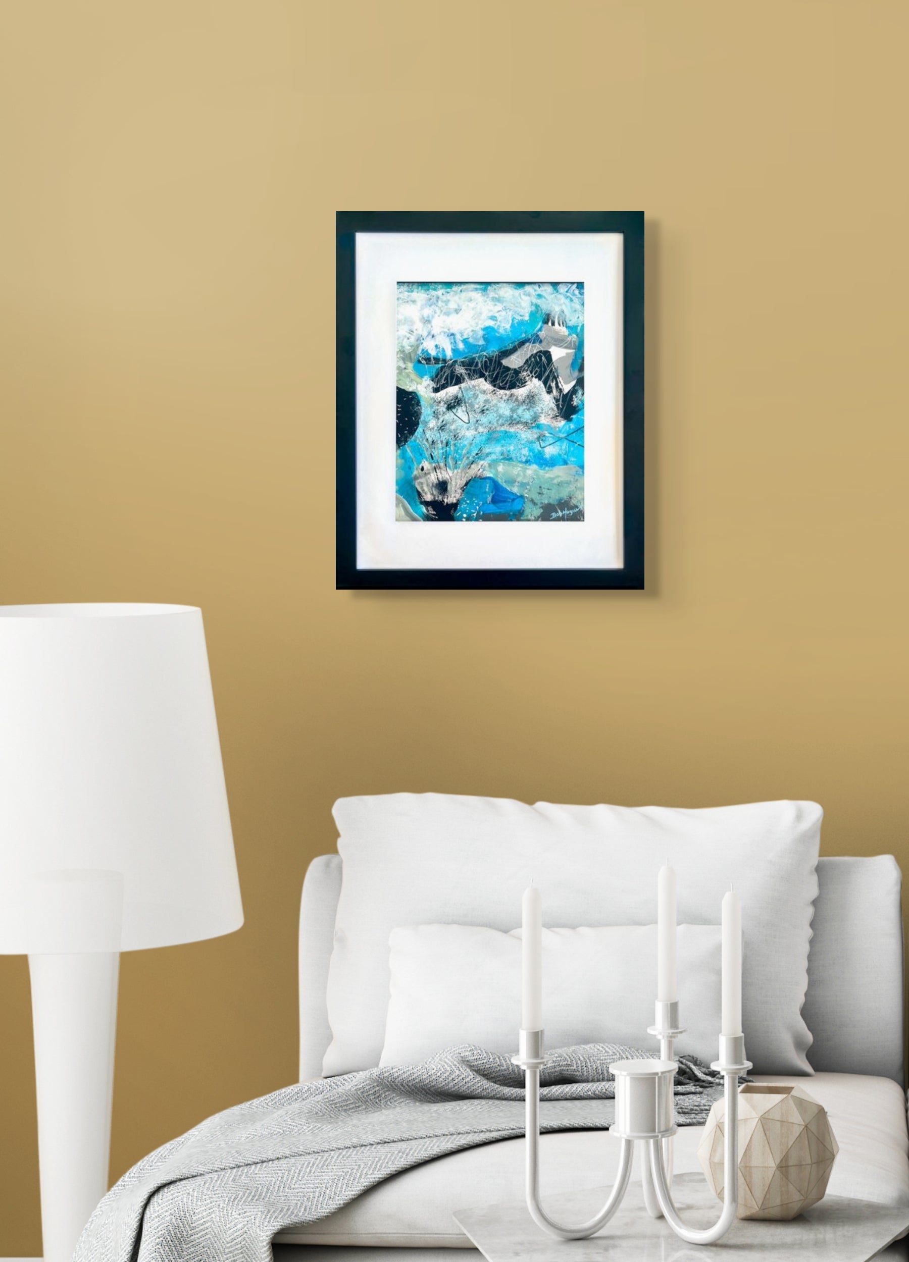 Abstract image in hues of blue, white and black. A dark image is in the center of the piece, left for interpretation; shown framed with white mat and black wood frame; artist Bob Hogue; in situ