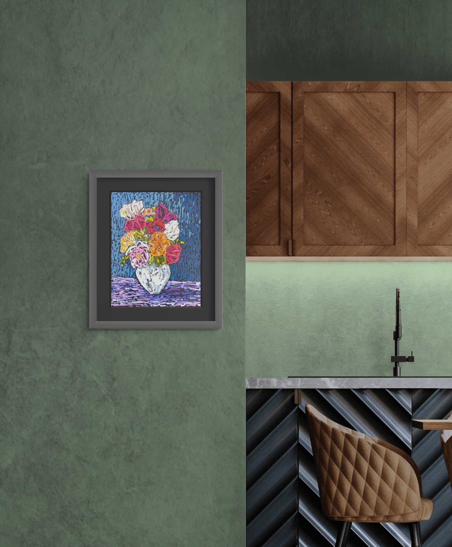 Colorful oil pastel painting of white vase filled with multi-colored flowers including red, pink, white and orange against a blue background; artist Rachel Bunteman; shown framed in situ on green wall;